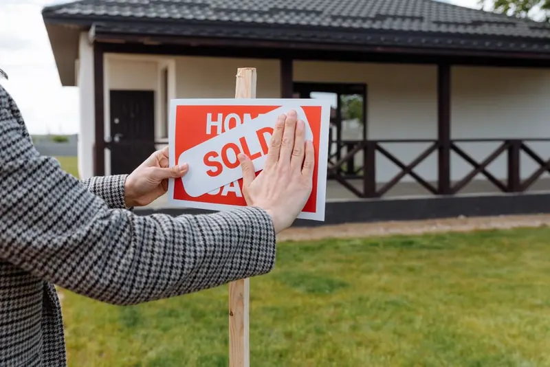 Sold sign outside a house, the point at which a missing garage conversion certificate usually surfaces