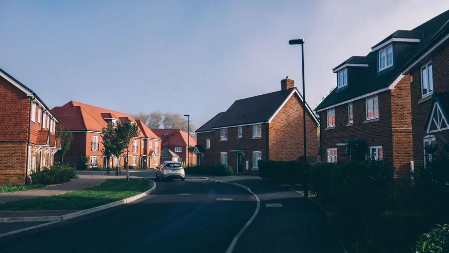 Modern housing estate street with attached garages, the kind of Cornish property where a garage conversion costs least