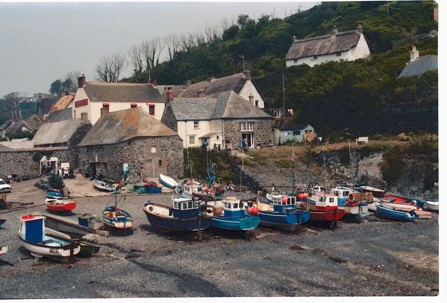 Cornish fishing village with cottages above the beach, the setting where converted rooms are most often let to holidaymakers