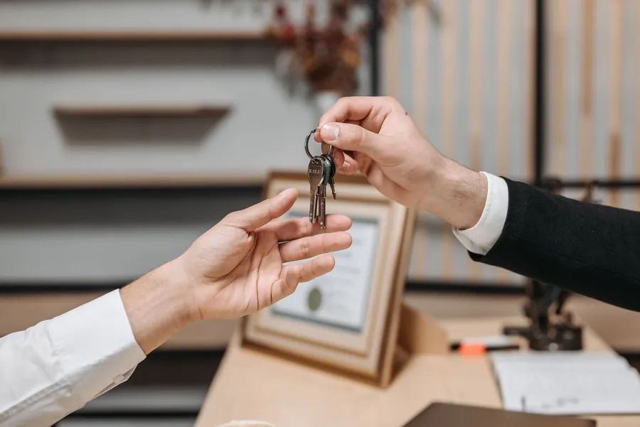 Keys being handed over for a holiday let in Cornwall created from a converted garage