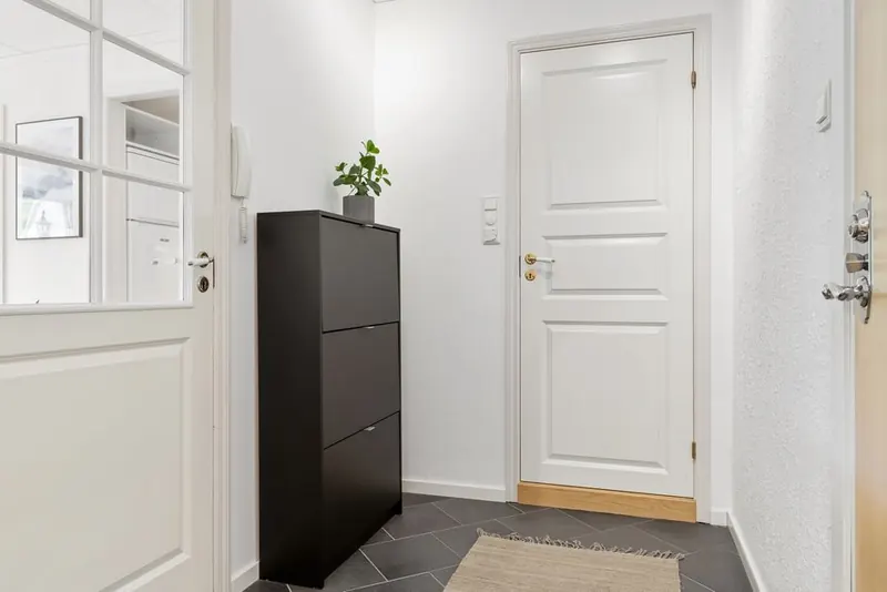 Fire doors onto a landing, the protected escape route required when a Cornish loft conversion creates a third storey