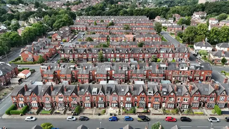 Row of terraced houses in England, the property type where a loft conversion usually beats a rear extension on value