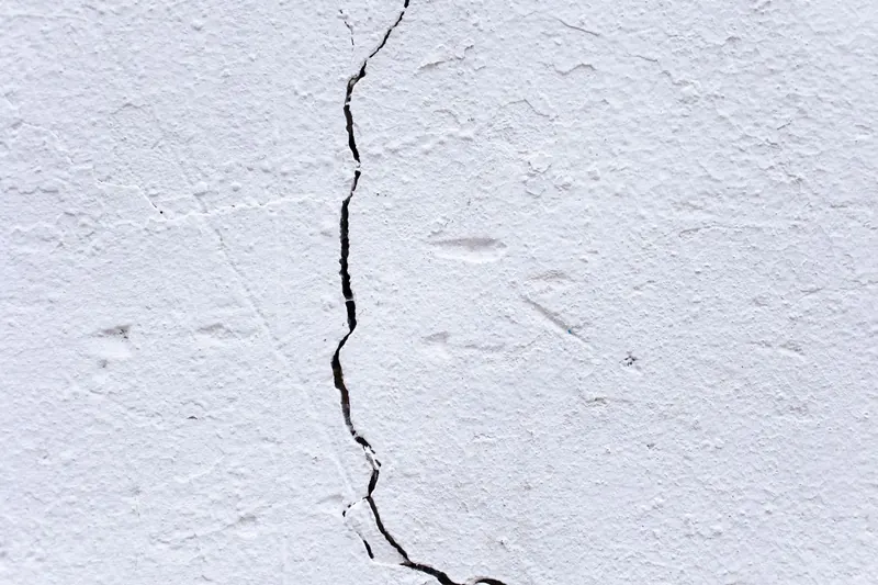 Cracked plaster recorded in a party wall schedule of condition in Cornwall