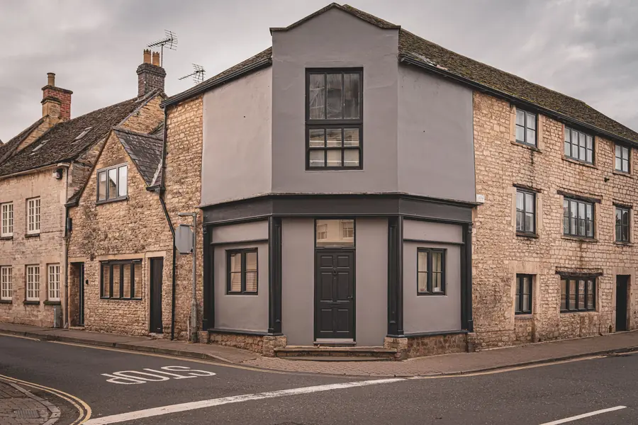 Older stone-built property of the kind that pushes conversion costs up and sits near a village price ceiling in Cornwall