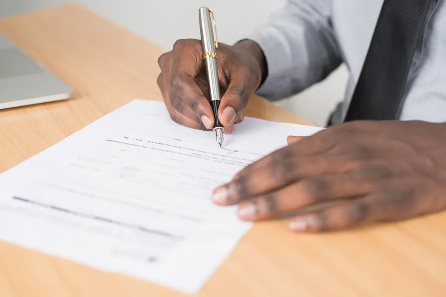 Signing lender paperwork for a further advance to fund a conversion in Cornwall