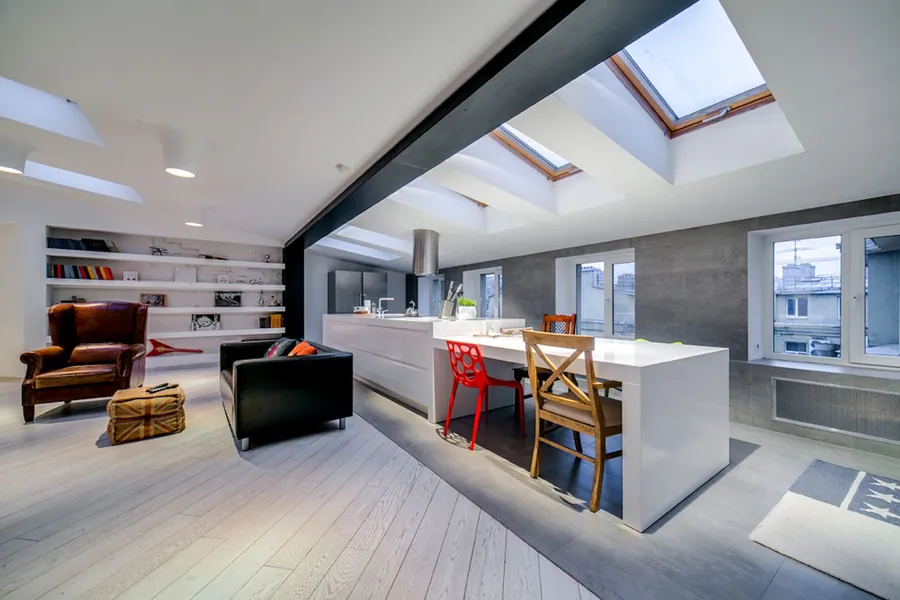 Loft room lit by rooflights set into the roof slope, a Velux style loft conversion