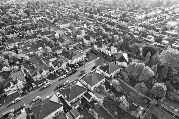 Aerial view of Cornish housing, illustrating how local house prices affect loft conversion value