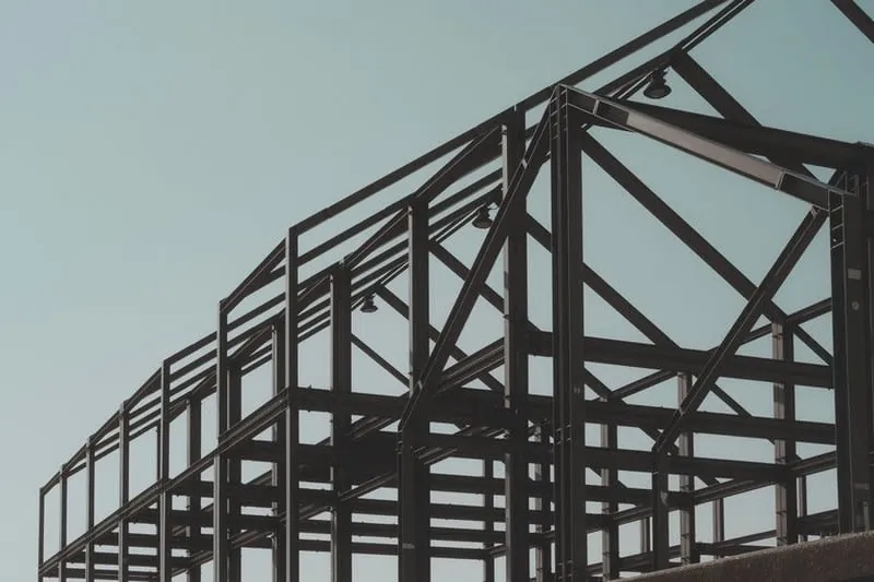 Steel beam being installed during structural work on a house conversion