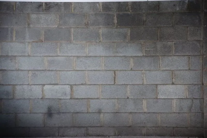 Single skin concrete block wall of the kind used to build garages in Cornwall