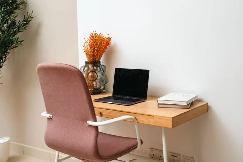 Home office with desk and laptop in a converted garage, the most requested conversion use in Cornwall