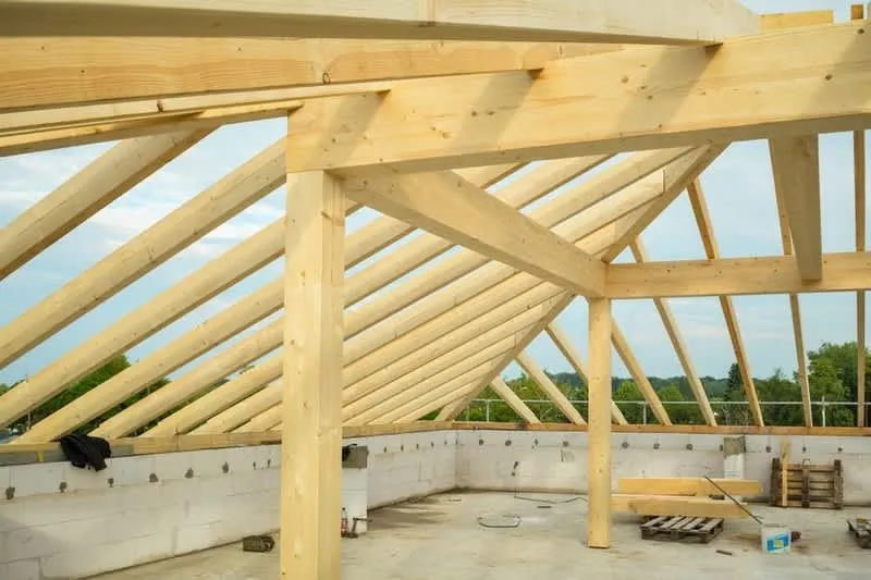 New roof timbers and rafters forming the structure of a loft conversion