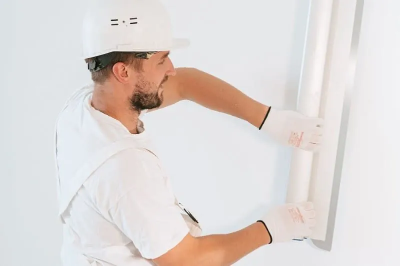 Plasterboard being fitted during the internal stage of a loft conversion