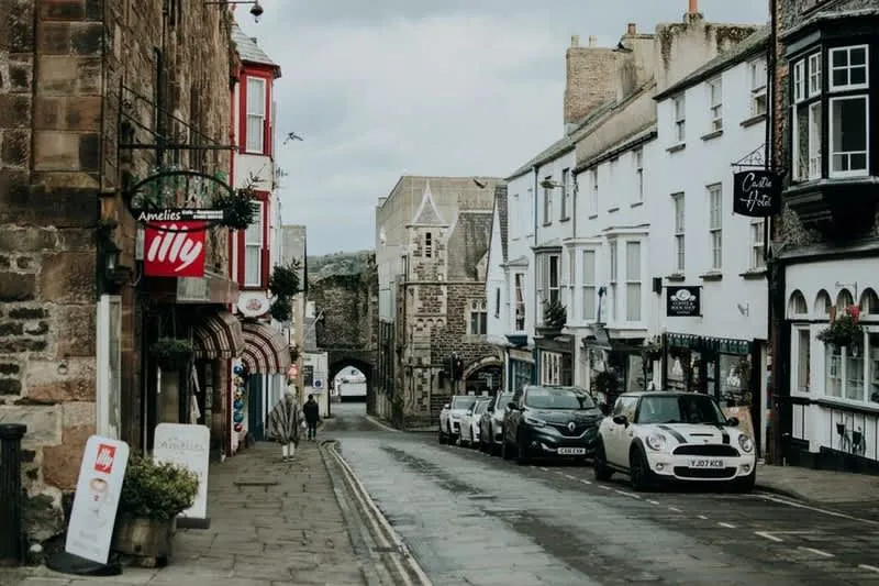 Cars parked along a street in a British coastal town where garage space is scarce