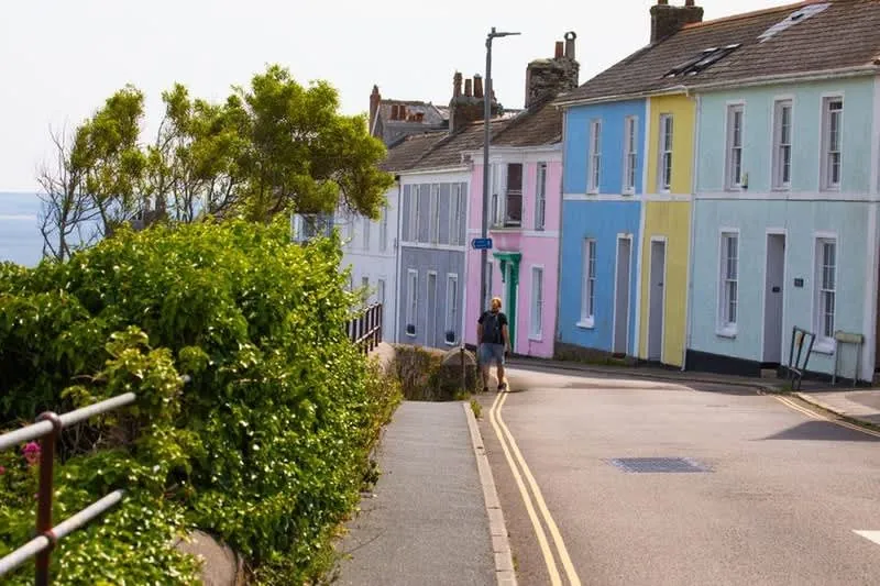 Pastel painted terraced street in Cornwall of the kind governed by estate design codes