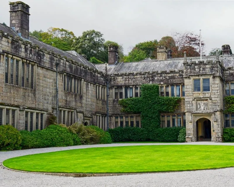 The granite gatehouse front of Lanhydrock House near Bodmin, Cornwall