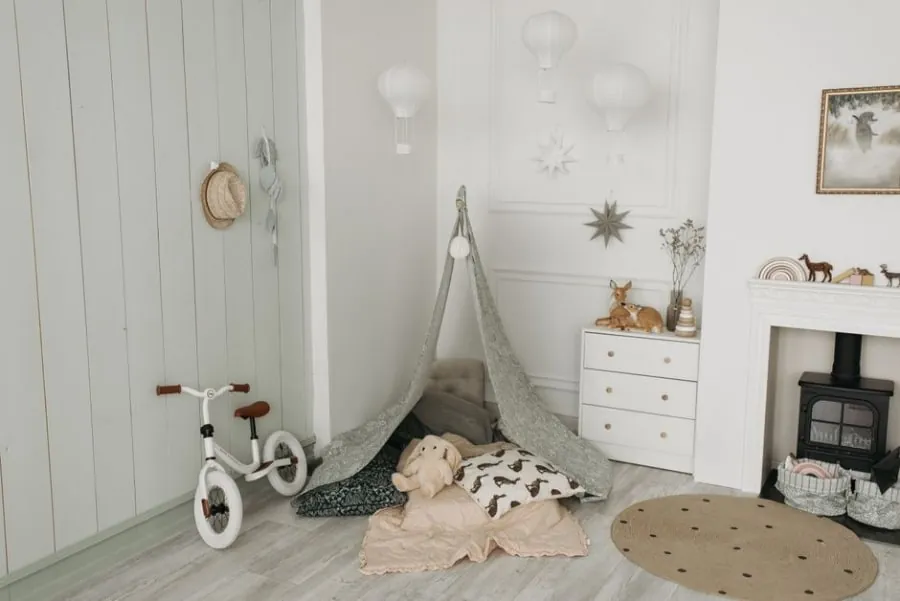 Children's bedroom created in a loft conversion, with bunk beds under the eaves