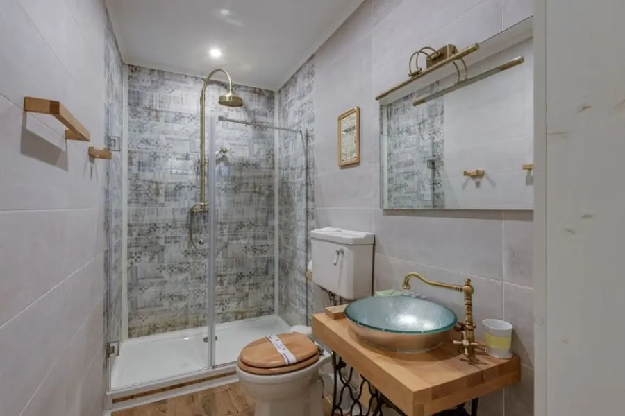 Shower room fitted into the eaves of a loft conversion in Cornwall