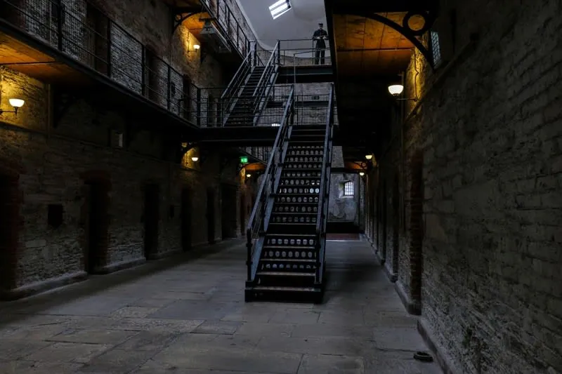 Galleried landings and an iron staircase inside a historic Victorian prison